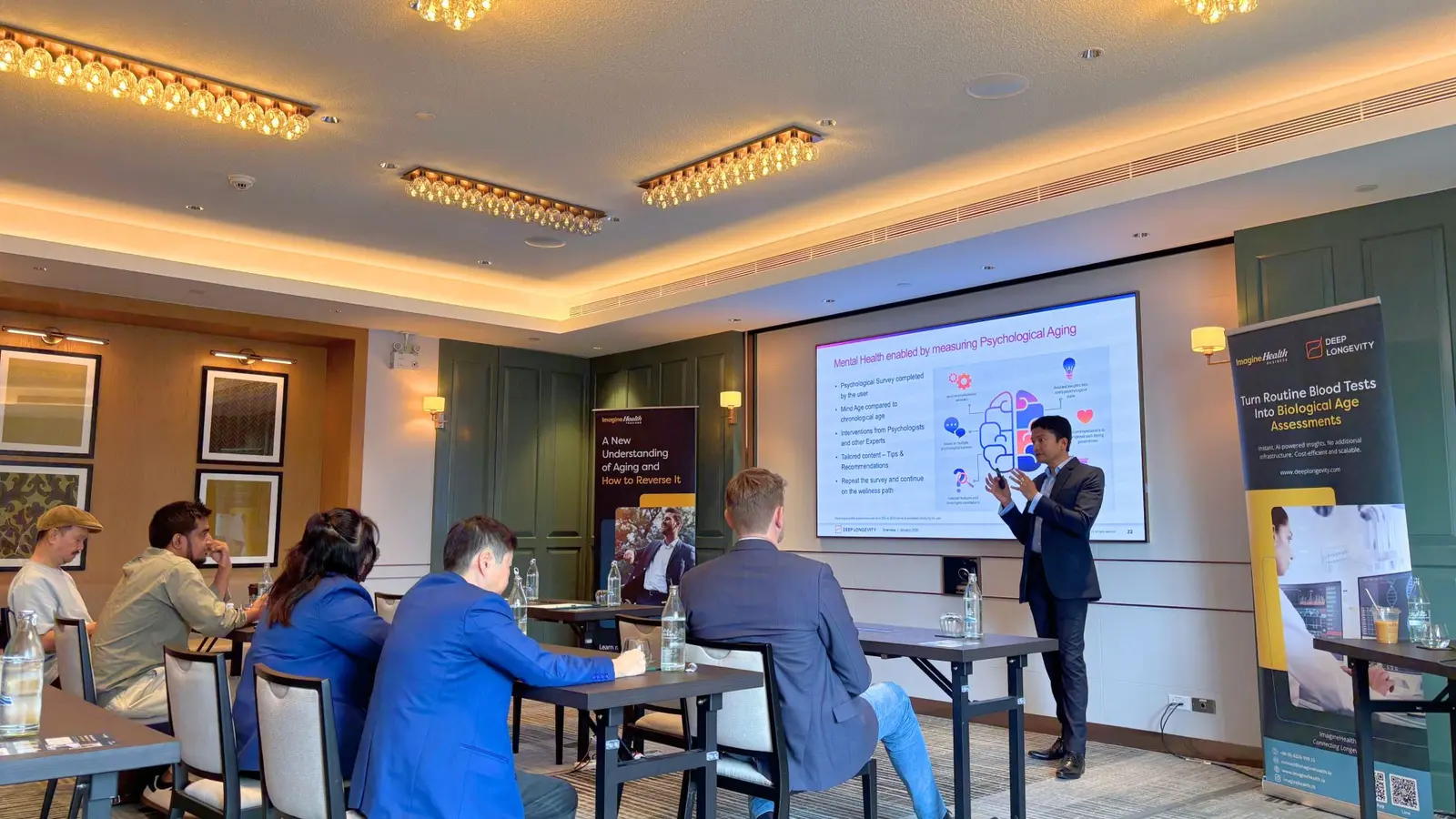 Deepankar Nayak presenting aging clock technology to healthcare professionals in Bangkok