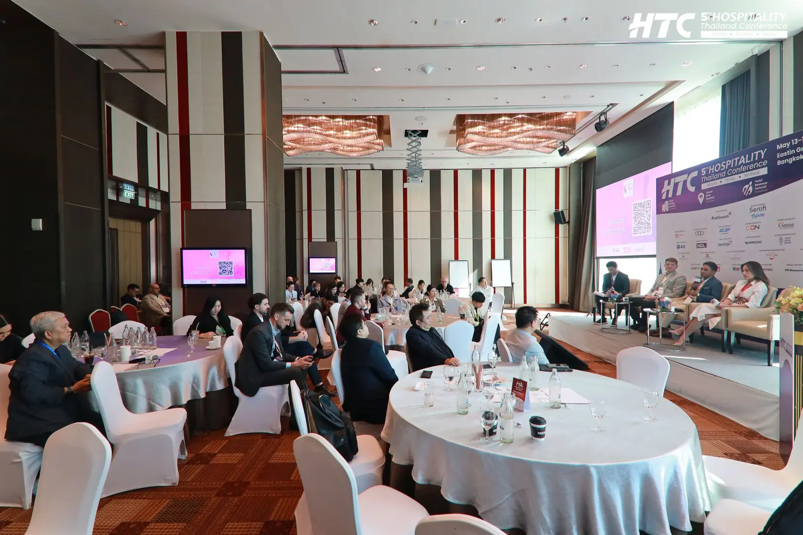 Hospitality professionals attending the wellness tourism panel at HTC 2026 in Bangkok
