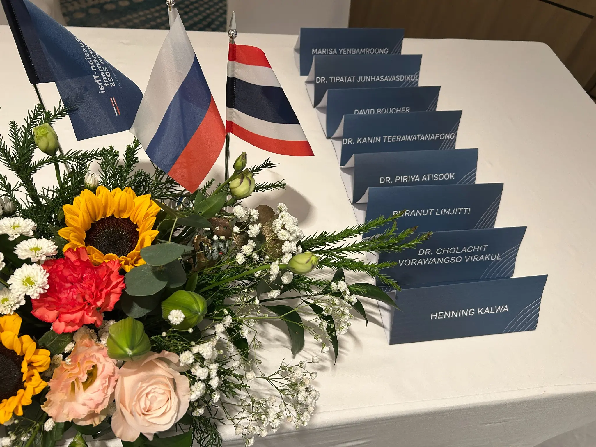 Healthcare and Biotechnology Track programme with Russian and Thai flags