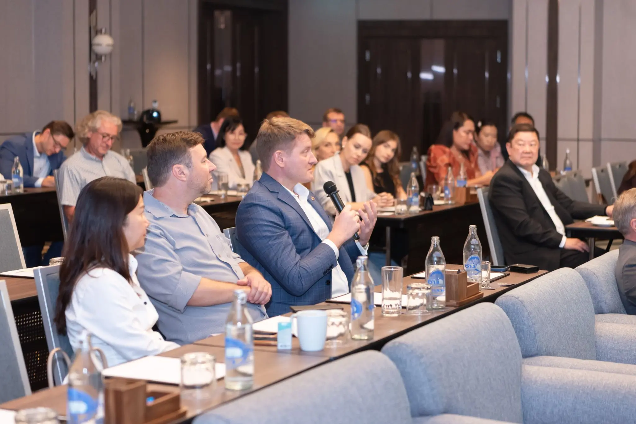 Thai and Russian business leaders participating in a cross-cultural seminar